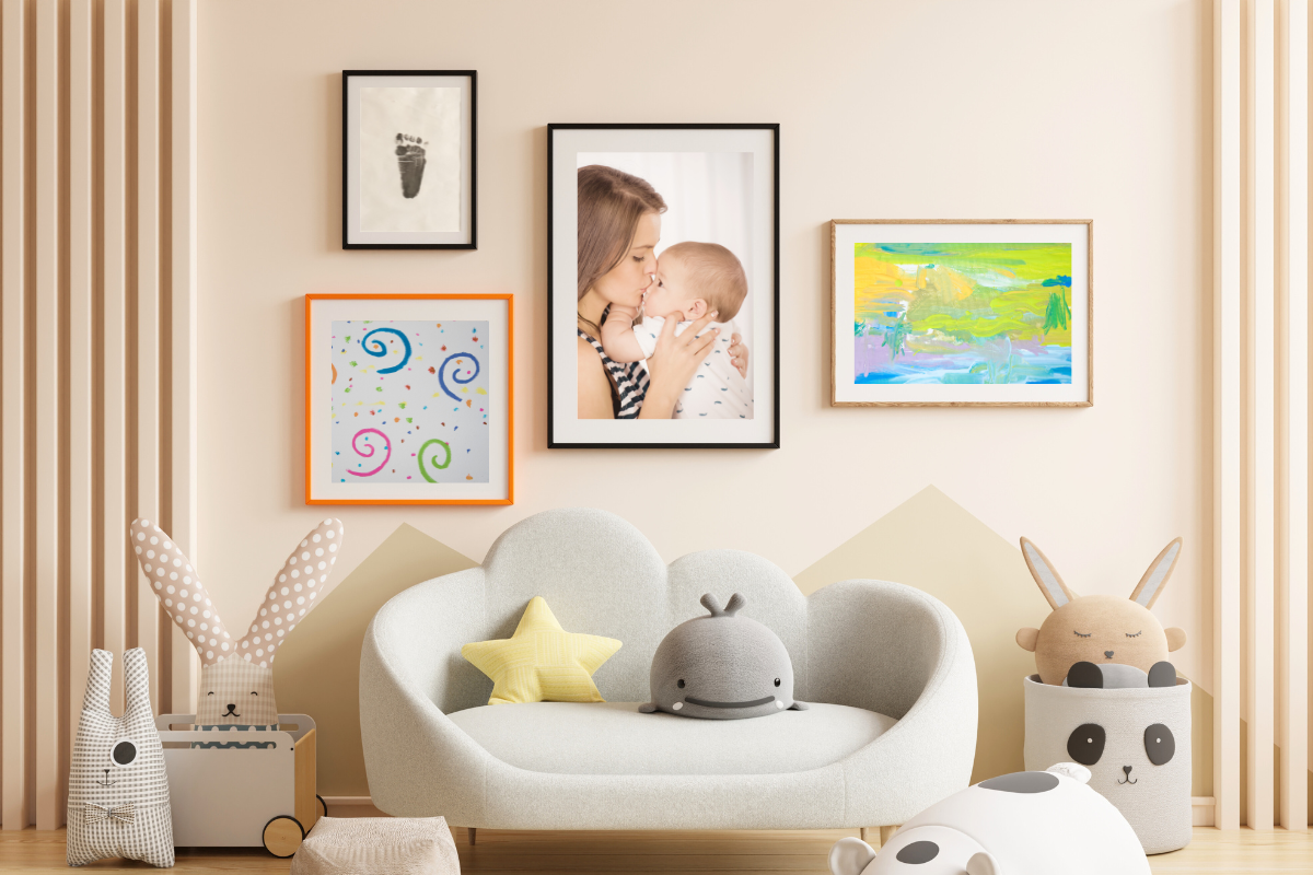 Children’s artwork displayed on a gallery wall as part of an intentional rotation and storage system.