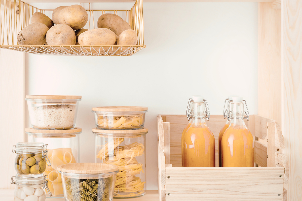Kitchen pantry organization with glass containers and everyday ingredients arranged for daily routines